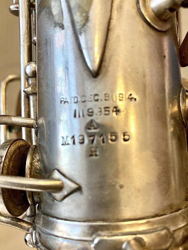 A 1927 Conn New Wonder Series 2 alto saxophone marked 'H' for 'High Pitch' (A=456 Hertz). Saxophones tuned to A=440 Hz would be marked 'L', 'LP' or 'L