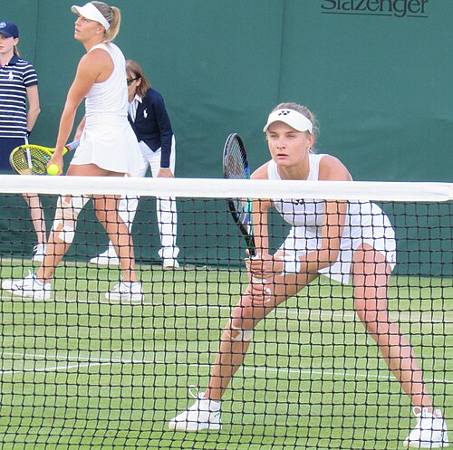 Yastremska in a doubles action along with Dalma Gálfi (back) at the 2022 Wimbledon Championships