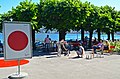 A public installation with sign "PrivacyFreeZone" in front of Lake Lugano.jpg