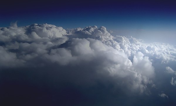 Clouds, formed by condensed water vapor