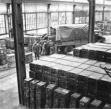 Ammunition being stacked in the ordnance store at No. 8 Army Roadhead Ammunition being stacked in the ordnance store at Second Army Roadhead.jpg