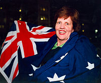 Shooter Elizabeth Kosmala at the 1996 Atlanta Paralympic Games Australian paralympic shooter, Elizabeth Kosmala with the Australian flag (2).jpg