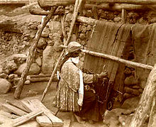 Azerbaijani woman makes a carpet. Early 20th century Azeri carpet-maker.jpg