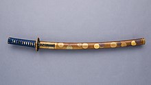 Mounting for wakizashi decorated with lacquer of maki-e technique. 18th century Blade and Mounting for a Short Sword (Wakizashi).jpg
