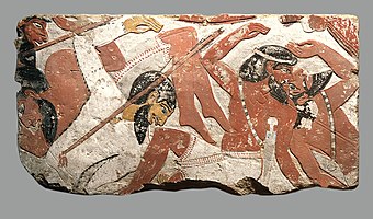 Block from a relief depicting a battle; 1427–1400 BC; painted sandstone; height: 61.5 cm (24.2 in); Metropolitan Museum of Art (US)