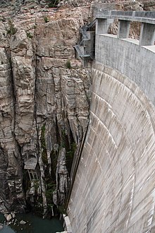 Downstream face of the dam, showing the new 25-foot section on top of the original dam