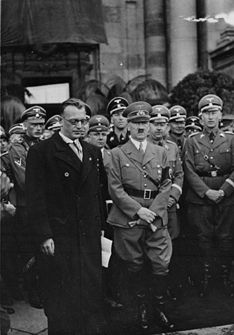 Arthur Seyss-Inquart, Adolf Hitler, Heinrich Himmler, and Heydrich in Vienna, March 1938