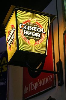 A promotional sconce for Castel Beer, the company's core beer product Castel Beer.jpg