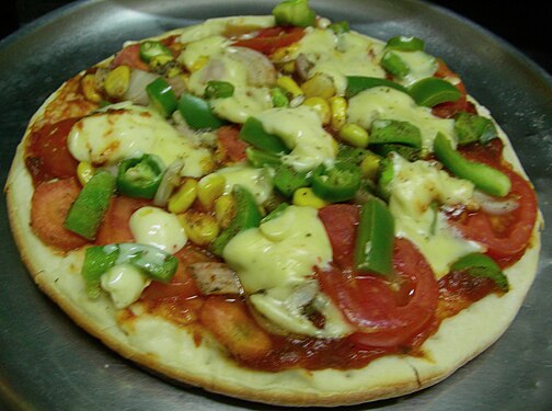 Chilly and pepper loaded Pizza