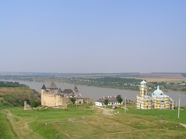 The Dniester in Khotyn (western Ukraine). Another Moldavian fortress and an Orthodox church seen on foreground.