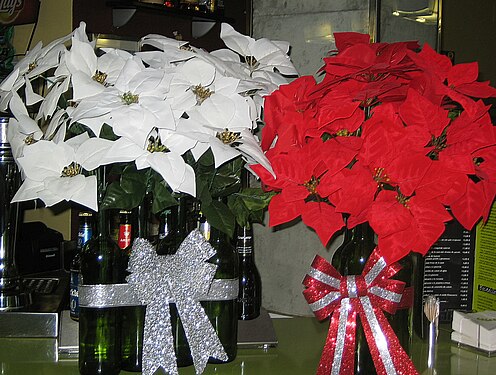 Flowers (arificial) and bottles