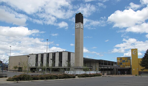 Clock tower at Elizabeth City Shopping Centre with the Windsor building to the left of the picture.