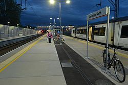 Cambridge North railway station platforms in May 2017 Cmglee Cambridge North platform night.jpg