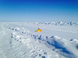 Highway sign in the snow, North Slope Borough, Alaska (17 April 2015)