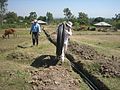 Daniel Oerther working with students to route drinking water distribution system in Otho Abwao Kenya.jpg