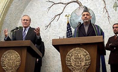 Rumsfeld with Afghanistan's President Hamid Karzai during a press conference at the Presidential Palace in Kabul, Afghanistan on April 13, 2005.