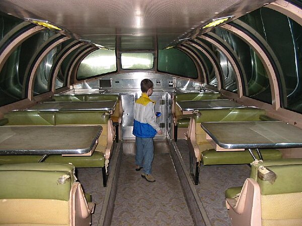 The upper-level interior of a dome car, configured as a dining area, on display at the National Railroad Museum in Green Bay, Wisconsin