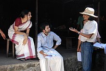 Raj Nair with Prithviraj Sukumaran and Samvrutha Sunil in the sets of Punyam Aham During filming.jpg