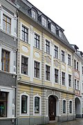 Residential house in closed development, corner house with frontage to Brüderstraße, with a connecting passage to Brüderstraße 13 and three candle arches to Schwarzen Gasse 3, 4