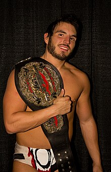 Gargano with the Open the Freedom Gate Championship belt in January 2013 Gargano with belt.jpg