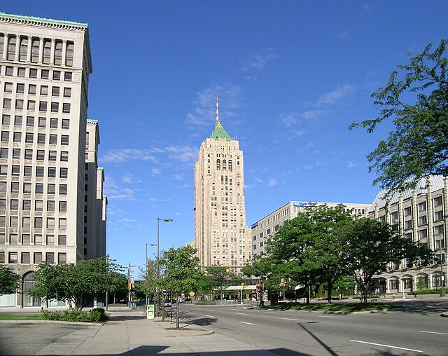 Grand Boulevard looking west through New Center. The National Historic Landmarks Cadillac Place (left) and the Fisher Building in the background, with
