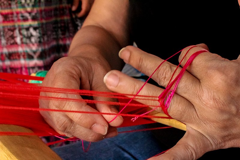 File:Hands and threads.jpg