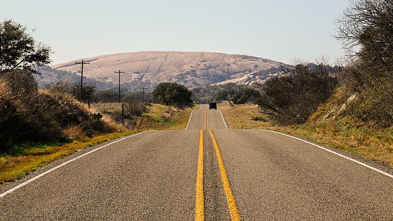 File:Highway Approaching Enchanted Rock.jpg