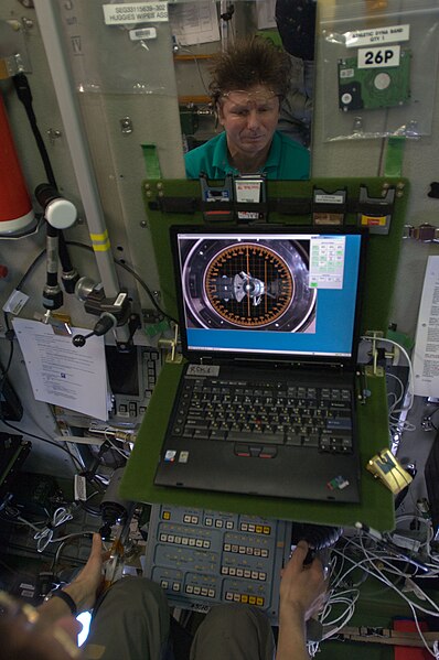 File:ISS-20 Gennady Padalka trains the relocation of the Soyuz TMA-14 spacecraft in the Zvezda Service Module.jpg