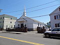 Igreja Adventista do Setimo Dia, a Portuguese Seventh Day Adventist church located at 211 Charles Street, Lowell, Massachusetts. North (front) and south sides of building shown.