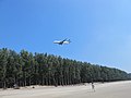 "Incoming_airplane_over_the_beach_of_Cox's_Bazar_02.jpg" by User:Kritzolina