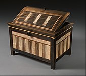 Inlaid box for cosmetic vessels of Sithathoryunet; 1887–1813 BC; ebony, inlaid with ivory and red wood (restored) and gold trim; height: 25.2 cm, length: 36.4 cm, depth: 25.2 cm; Metropolitan Museum of Art