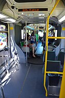 Interior_of_C-Tran_Vine_bus_towards_front_from_rear_section,_with_bike_racks