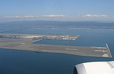 Kansai Airport located off the coast of Osaka Bay Kansaiviewfromplane.JPG