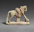 Миниатюра для Файл:Limestone horse with a rider hunting a lion MET DP157064.jpg