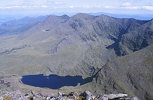 View from Carrauntoohil of the eastern section of the Reeks showing (l-to-r) Cruach Mhor, The Big Gun, Cnoc na Peiste and Maolan Bui; including Maolan Bui's large narrow north-west spur, The Bone. Macgillycuddy's Reeks, Lough Callee and Cnoc na Peiste (Knocknapeasta) - geograph.org.uk - 1434579.jpg