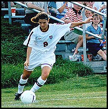 Mia Hamm takes corner kick.