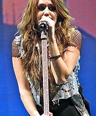 Cyrus performing "Party in the U.S.A." during the Wonder World Tour. Miley Cyrus - Wonder World Tour - Party in the U.S.A. 4.jpg