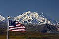 Mount McKinley, with US Flag at Eielson Visitor Center (5300913475).jpg