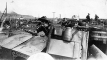 Colorado National Guard soldiers taking cover during the Ludlow Massacre. National Guardsmen in Ludlow, 20 April, 1914.png