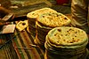 Peshwari naan freshly prepared in a tandoor in Karachi