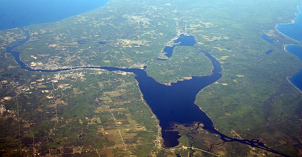 Hancock is on the north bank of the Keweenaw Waterway, opposite Houghton, Michigan. Portage Lake is at right center of this 2010 photo.