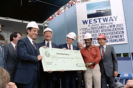President Ronald Reagan presenting Mario Cuomo and other New York leaders with a check for Westway Project Funds, September 1981