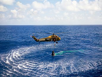HUS-1 helicopter from USS Lake Champlain recovering Alan Shepard from the Freedom 7 capsule