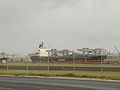 Cargo ship unloading at the San Juan Port.