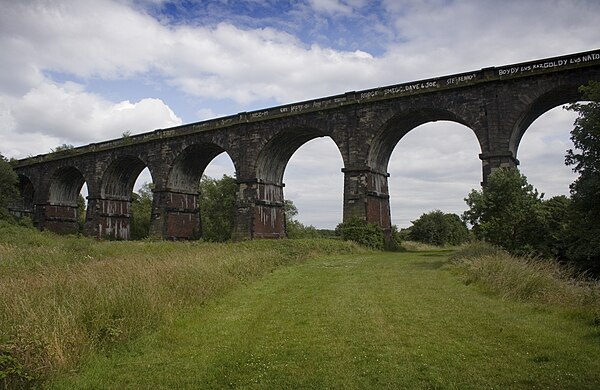 Stephenson's viaduct crosses the Sankey Brook, and the remains of the Sankey Canal. The viaduct is in use to this day.