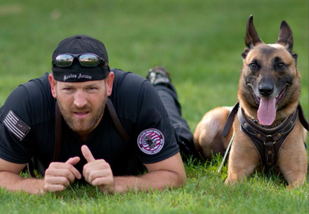 Secret Service officer and his police dog as part of the Emergency Response Team (ERT)