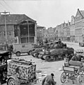 Sherman tanks of the Royal Scots Greys, 4th Armoured Brigade surrounded by abandoned German transport in Wismar, 4 May 1945