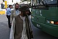 Shir Agha steps off a bus in Amman, Jordan, April 21, 2011 110421-M-GW940-015.jpg