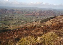 The western slope; the lowlands between Mullaghbane and Lislea and in the background The Ring of Gullion (Slievenacapple)