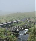 Fußgängerbrücke über den Bach Hoydalsá, vom Wasserfall August 2019